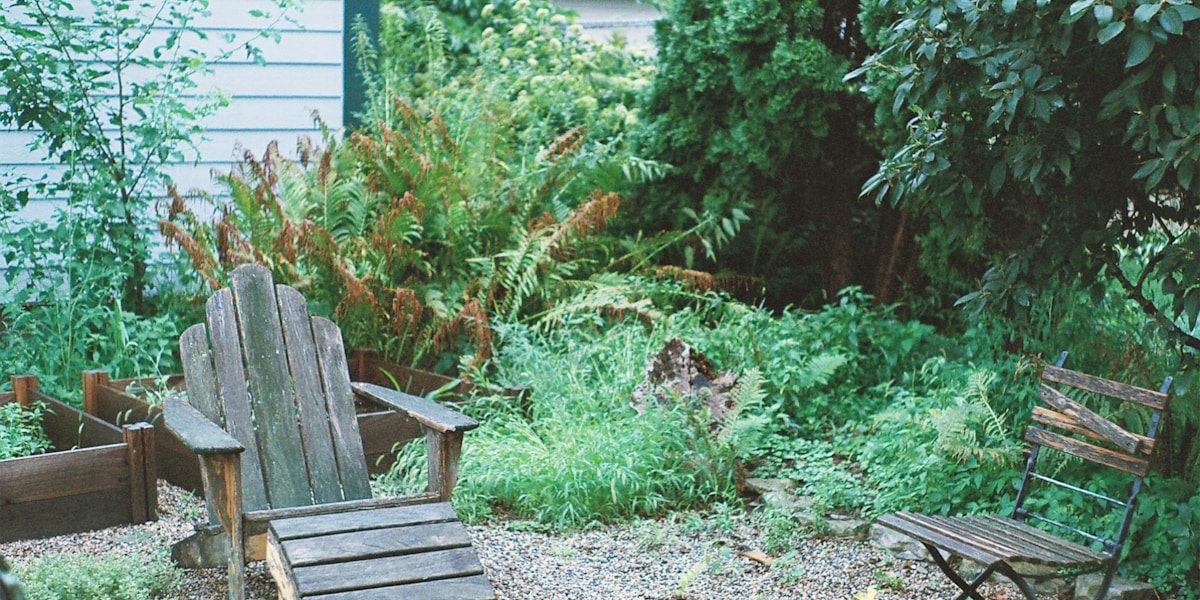 Backyard before and after transformation with pavers and BBQ